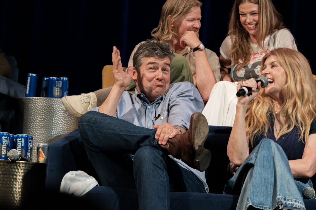 Kyle Chandler (Coach Eric Taylor), Connie Britton (Tami Taylor), Jesse Plemons (Landry Clarke), and Adrianne Palicki (Tyra Collett) at the Friday Night Lights Reunion in Austin, TX. Image taken 5/29/26 by Paul Daley. Copyright 2026 Pod Clubhouse.